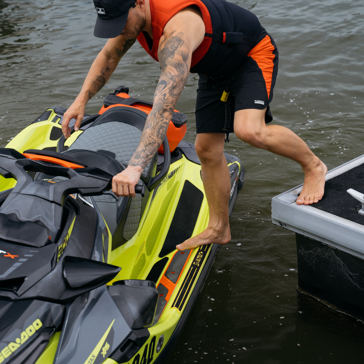 guy hoping on jet ski