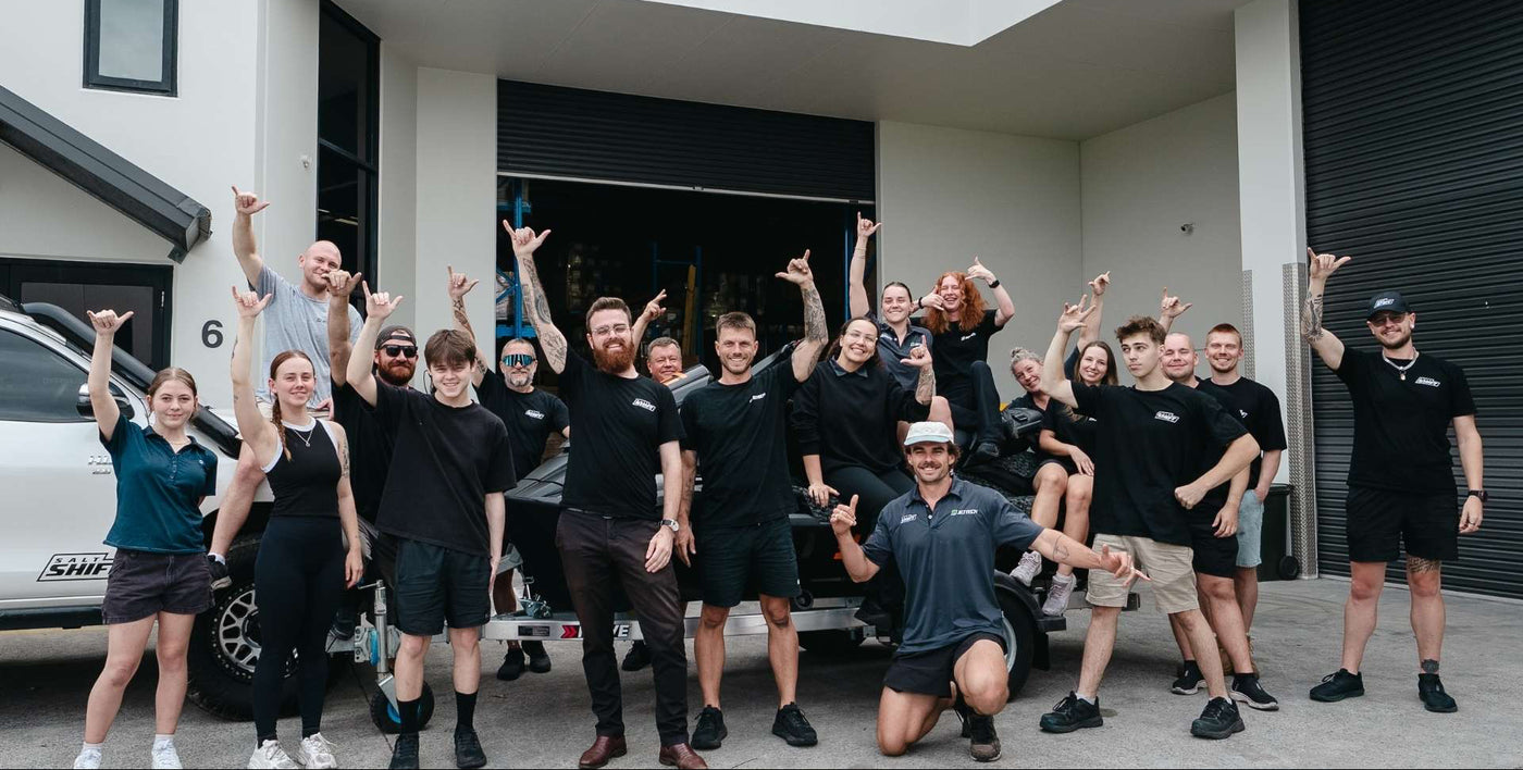 Group of people in front of jet tech and salt shift