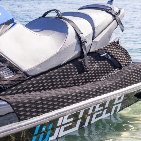 jet ski with black turf