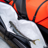 fish in catch dry bag on jet ski