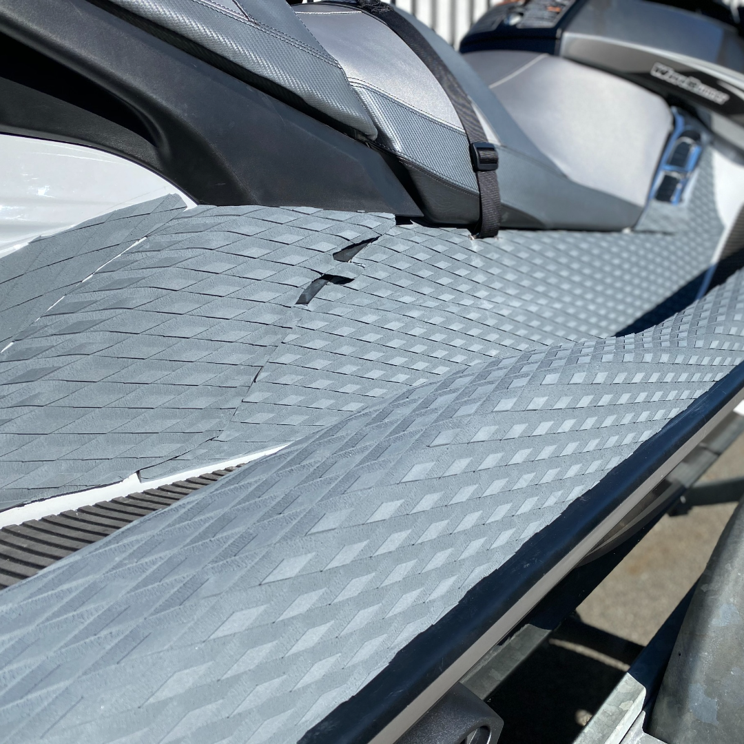 jet ski with grey turf