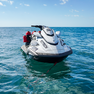 jet ski anchored in the surf