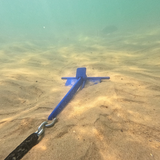 Anchor lodged in sand 