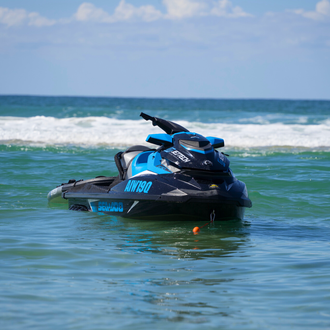 jet ski anchored floating on water